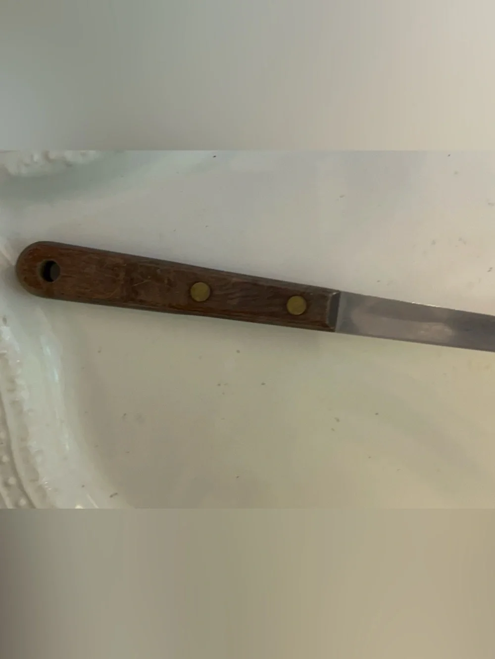 Vintage slotted Spoon with Wooden Handle